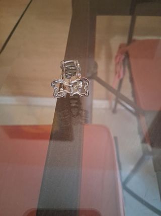 Pinza pelo pavo real brillante