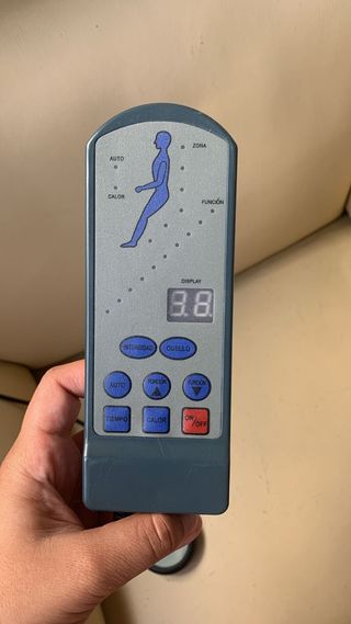 Butaca con funcion de masaje y reclinable.