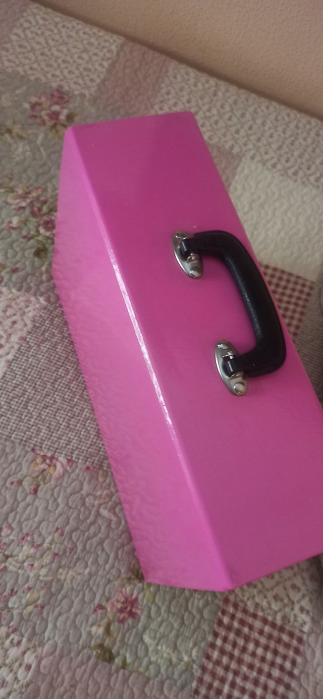 Archivador rosa con asa