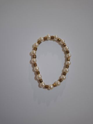 Pulsera perlas-doradas