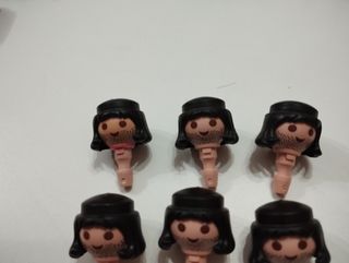 Playmobil lote cabezas.