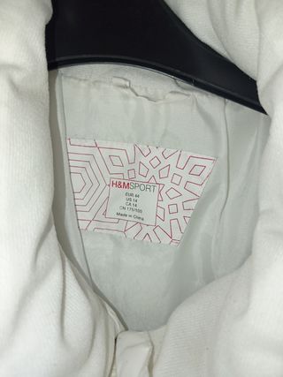 Chaleco plumífero beige mujer