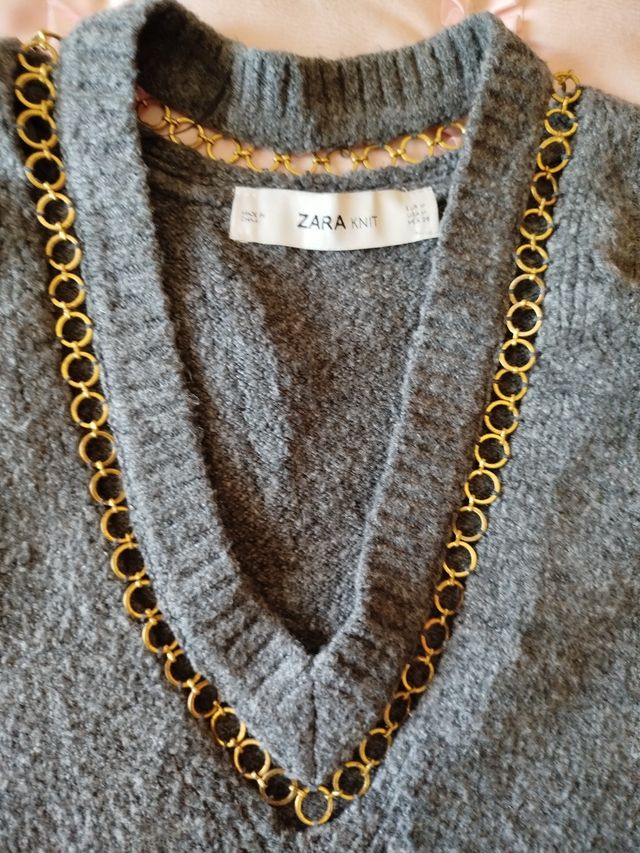 Jersey gris-dorado talla M