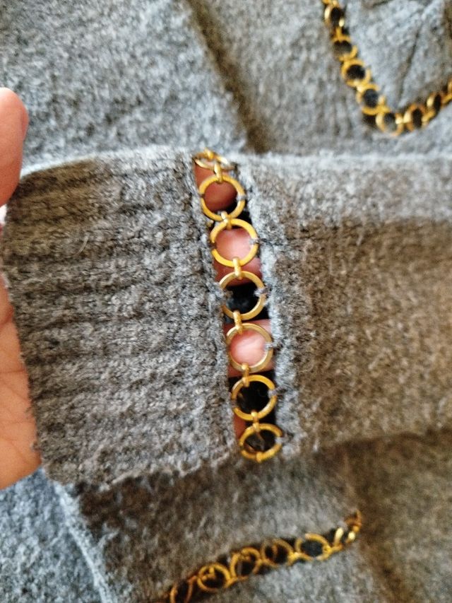 Jersey gris-dorado talla M