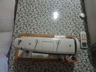 Máquina de coser Singer Antigua