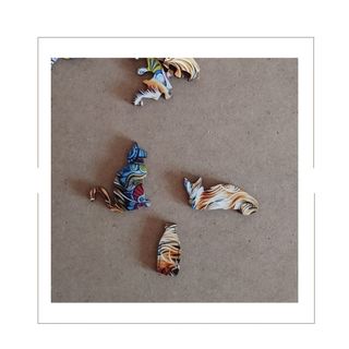 Puzzle rompecabezas de madera. Gato