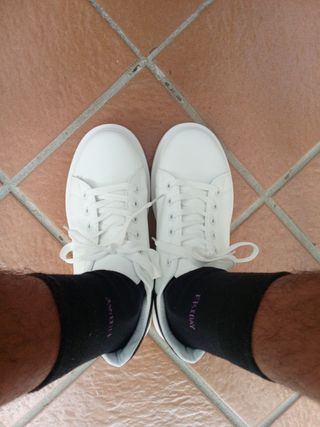 Zapatillas Nike blancas hombre 
Las e comprado 200