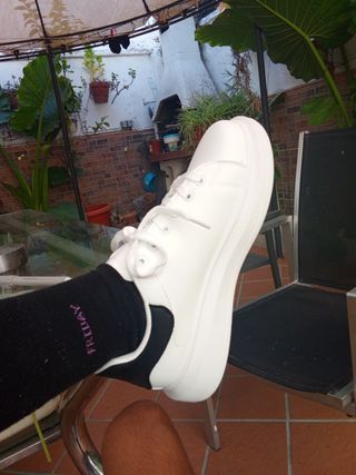 Zapatillas Nike blancas hombre 
Las e comprado 200