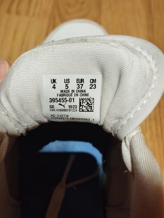 Zapatillas Puma blancas con purpurina rosa
