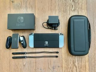 NINTENDO SWITCH OLED GRIS-BLANCO