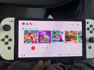Nintendo Switch Oled + juego de Mario kars deluxe 