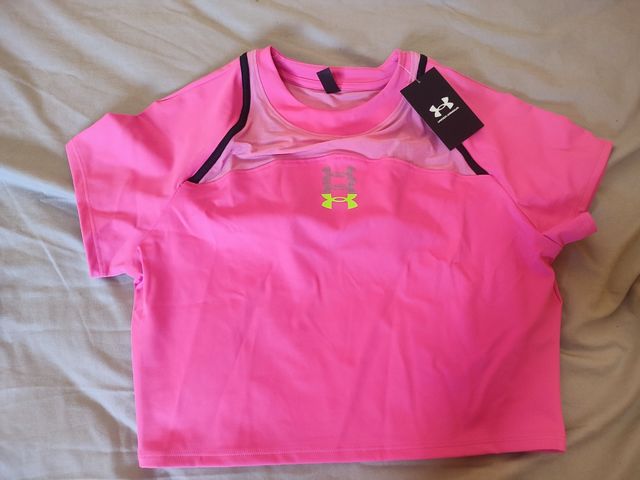 Top deportivo mujer under armour rosa