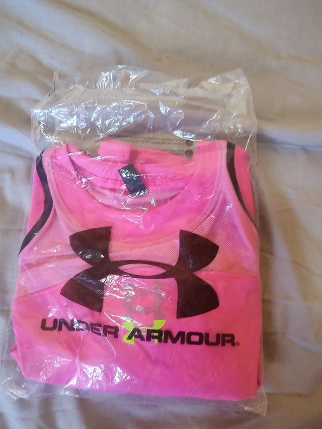 Top deportivo mujer under armour rosa