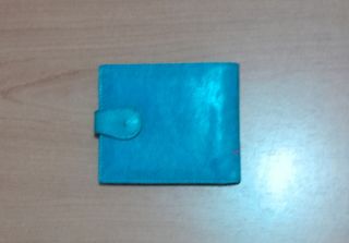 Monedero turquesa con dibujos