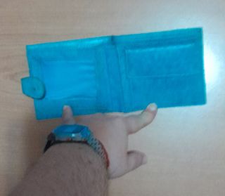 Monedero turquesa con dibujos