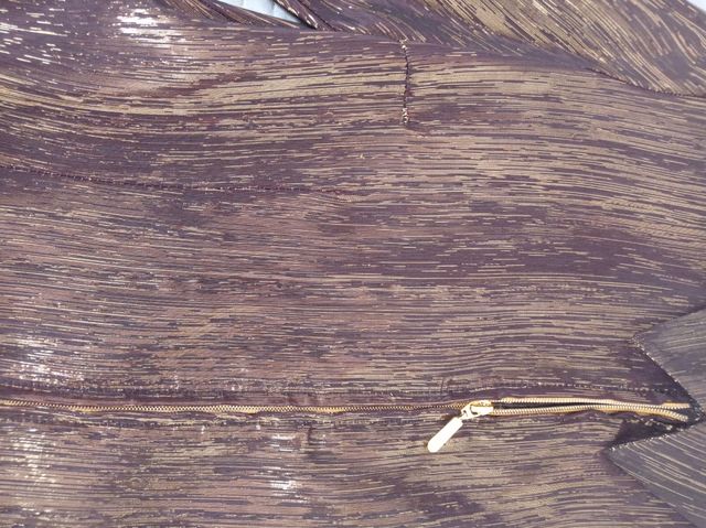 Blusa elegante marrone e oro