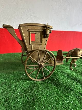 Carruaje bronce: adorno antiguo