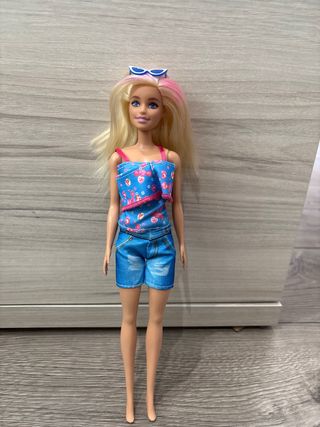 Muñeca Barbie con bici
