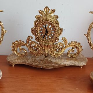 Reloj candeleros dorados