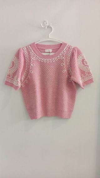 Jersey rosa , talla única.
