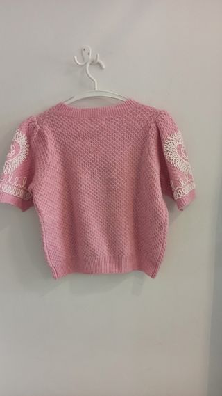Jersey rosa , talla única.
