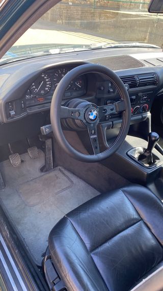 Volante semi-desplazado + piña Momo BMW e30 e34