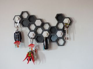 Appendichiavi a Esagoni Grigio-Bianco