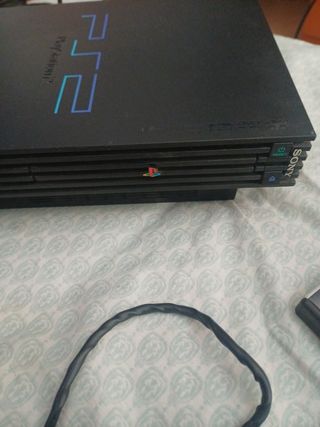 PlayStation 2 negra - 2 juegos