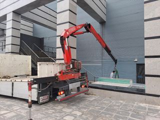 Grúa y transporte.