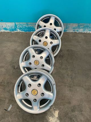 4 Llantas aluminio usadas sin neumáticos 