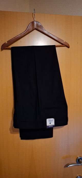Pantalón vestir azul marino de caballero.