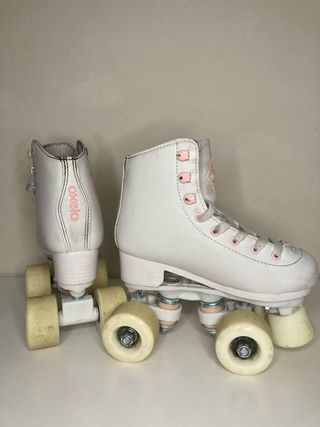 Patines Oxelo blancos 4 ruedas. T 31