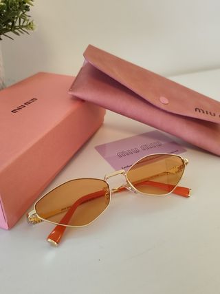 Occhiali Miu Miu - Oro e arancione