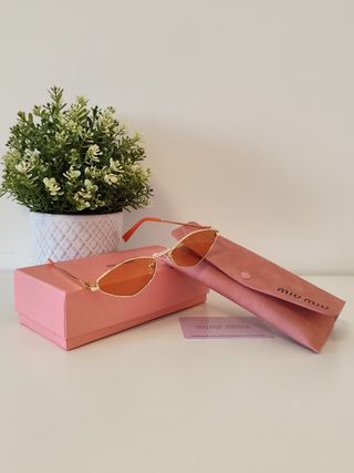 Occhiali Miu Miu - Oro e arancione