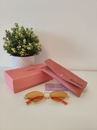 Occhiali Miu Miu - Oro e arancione