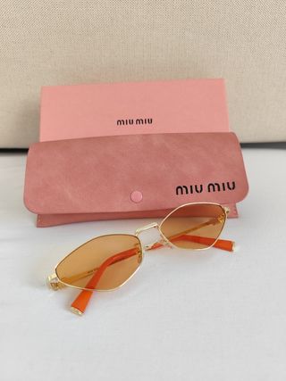 Occhiali Miu Miu - Oro e arancione