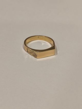 Sello oro 18 kilates.