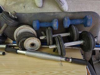 Máquina ejercicio + pesas y mancuernas y pesos