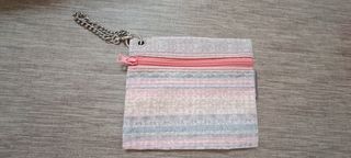 O bag rosa con manici in corda e borsello
