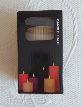 Portavelas vintage y vela.