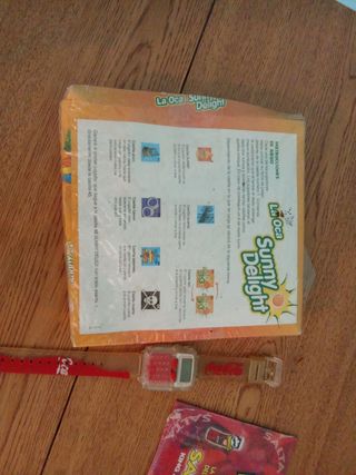 Juego La Oca Sunny Delight + Reloj Coca-Cola
