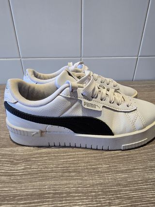 Zapatillas Puma blancas y negras