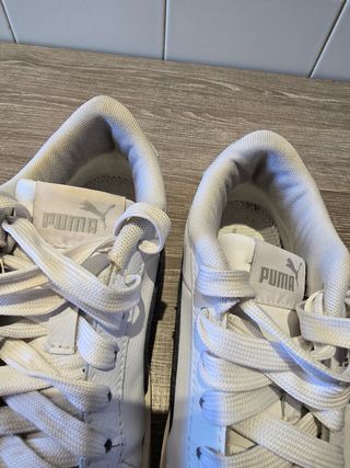 Zapatillas Puma blancas y negras