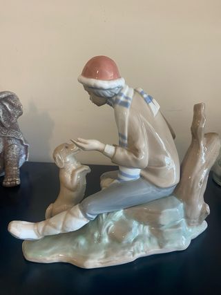 Figura Lladró niño perro porcelana