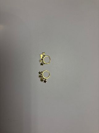 Pendientes aro estrellas dorados