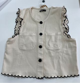 Chaleco vaquero beige marca Noon
