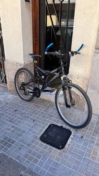 Bicicleta montaña doble suspensión