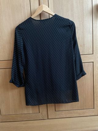 Blusa nera a pois - intrecciata