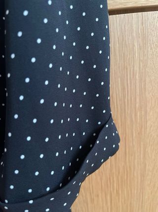 Blusa nera a pois - intrecciata