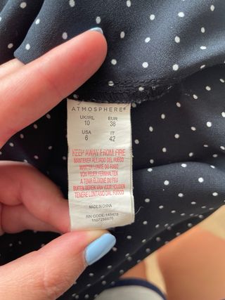 Blusa nera a pois - intrecciata